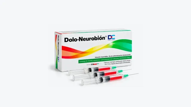 Caja blanca de Dolo-Neurobión DC con tres jeringas prellenadas de doble cámara con solución roja al frente