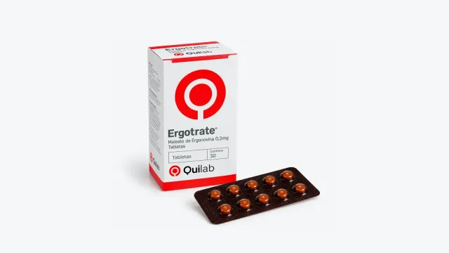 Caja blanca y roja de Ergotrate Quilab con maleato de ergonovina 0,2 mg y un blíster de diez tabletas marrones